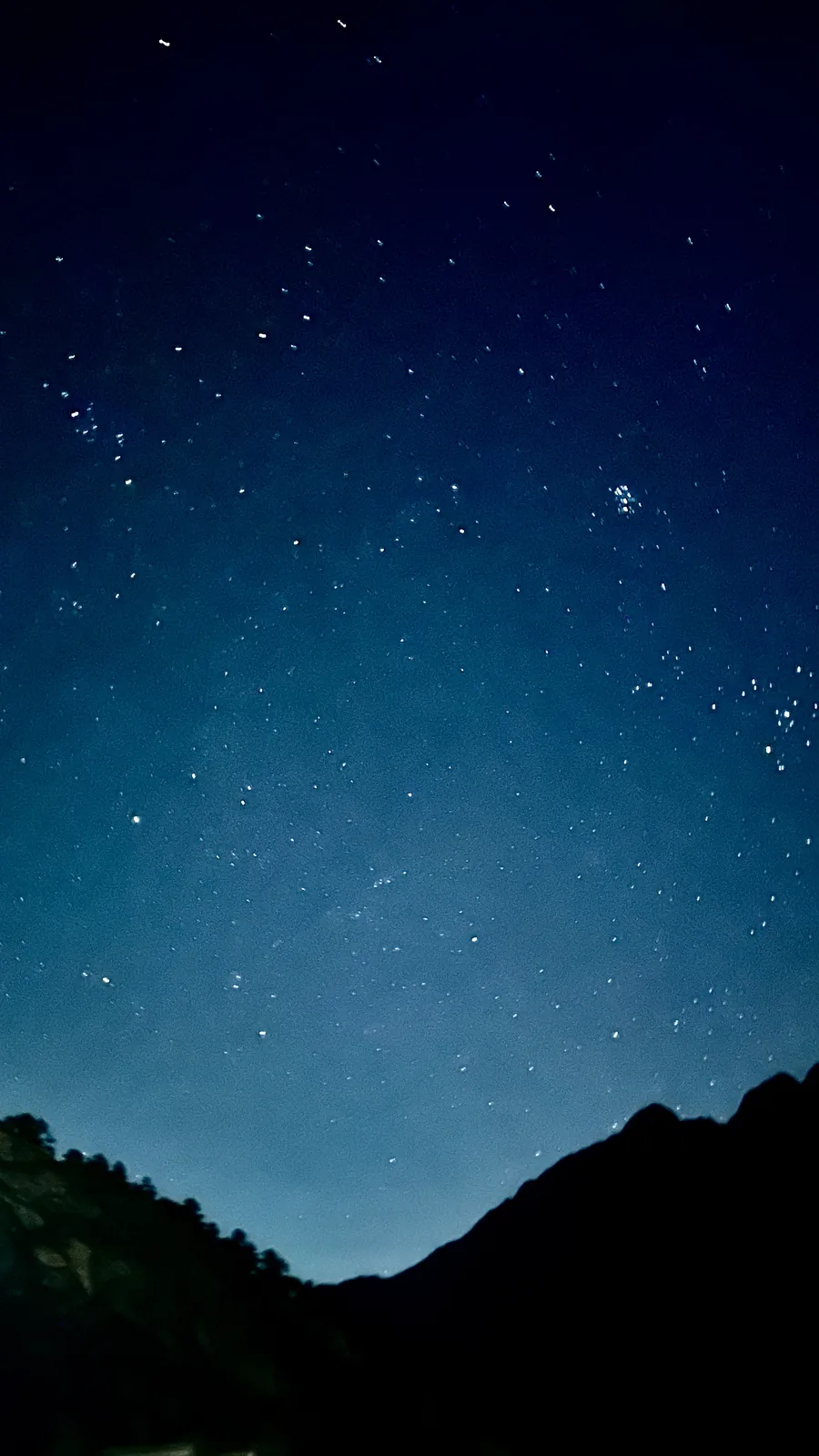 Stars over Tiger Leaping Gorge, photographed from the rooftop after dark